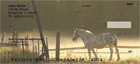 lains of a beautiful ranch, and horses grazing on their morning meal.