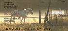 lains of a beautiful ranch, and horses grazing on their morning meal.