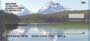 tural beauty as it is reflected by the the still waters below the horizon.